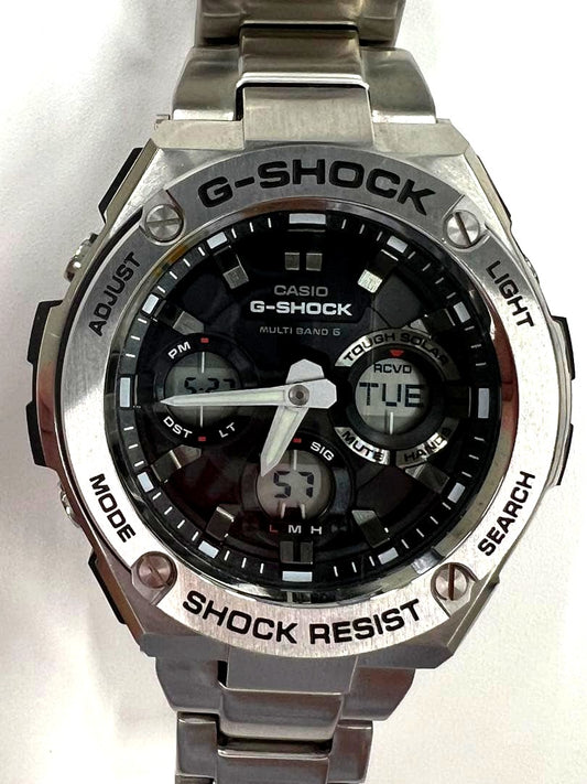 Casio G-Shock GST-W110 watch with black rubber strap and stainless steel replacement band