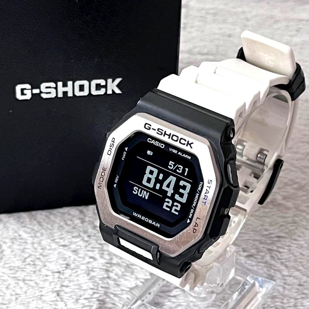 Casio G-Shock GBX-100 sport watch with black base, white and silver accents, high-visibility LCD, Japan import