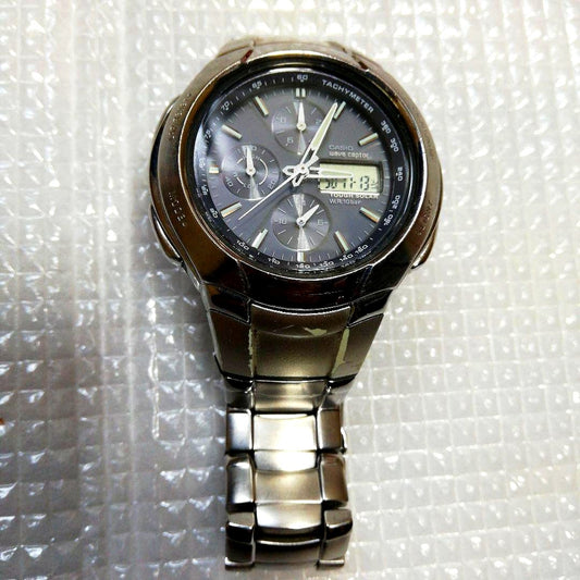 Casio Radio Wave Solar Watch with visible scratches and peeling band in used condition