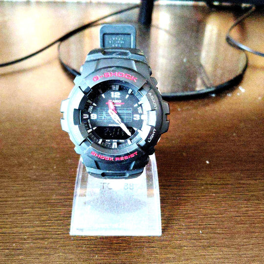 Casio G-Shock G-100-1BMJF watch with black silicon rubber band, battery included, and backlight for date display