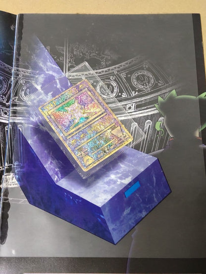 Nintendo Pokemon Ancient Mew first edition card with accompanying movie pamphlet showing wear and stains
