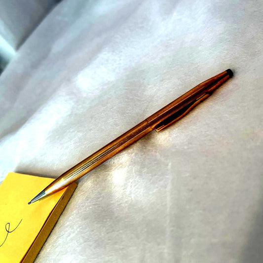 Cross Fine Point Mechanical Pencil in gold metal, approximately 5.1 inches long with minor scratches