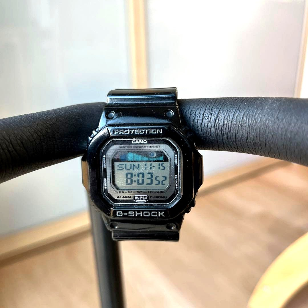 Casio G-Shock digital watch in black with shock resistant design and digital display showing time and alarm features