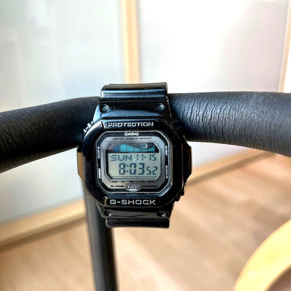 Casio G-Shock digital watch in black with shock resistant design and digital display showing time and alarm features