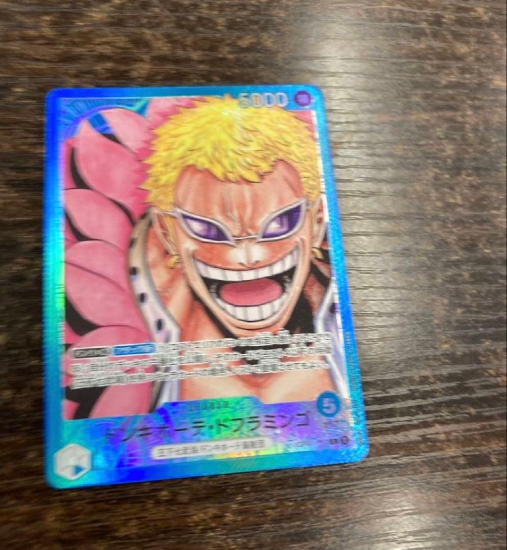 Don Quixote Doflamingo Leader Parallel OP01 One Piece trading card shown in product images