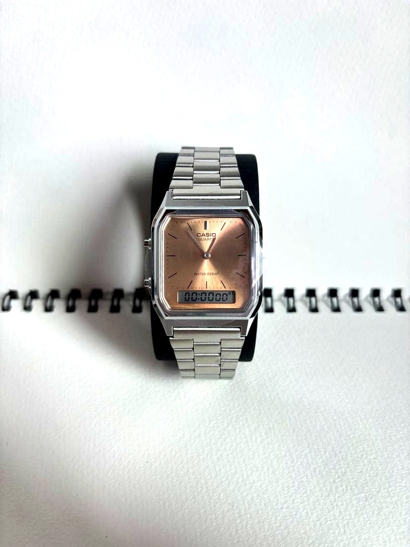 Casio AQ-230 salmon pink digital and analog watch with metal strap and included box and tags