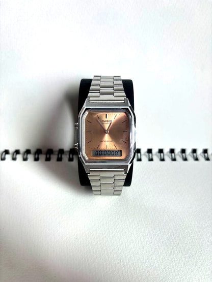 Casio AQ-230 salmon pink digital and analog watch with metal strap and included box and tags