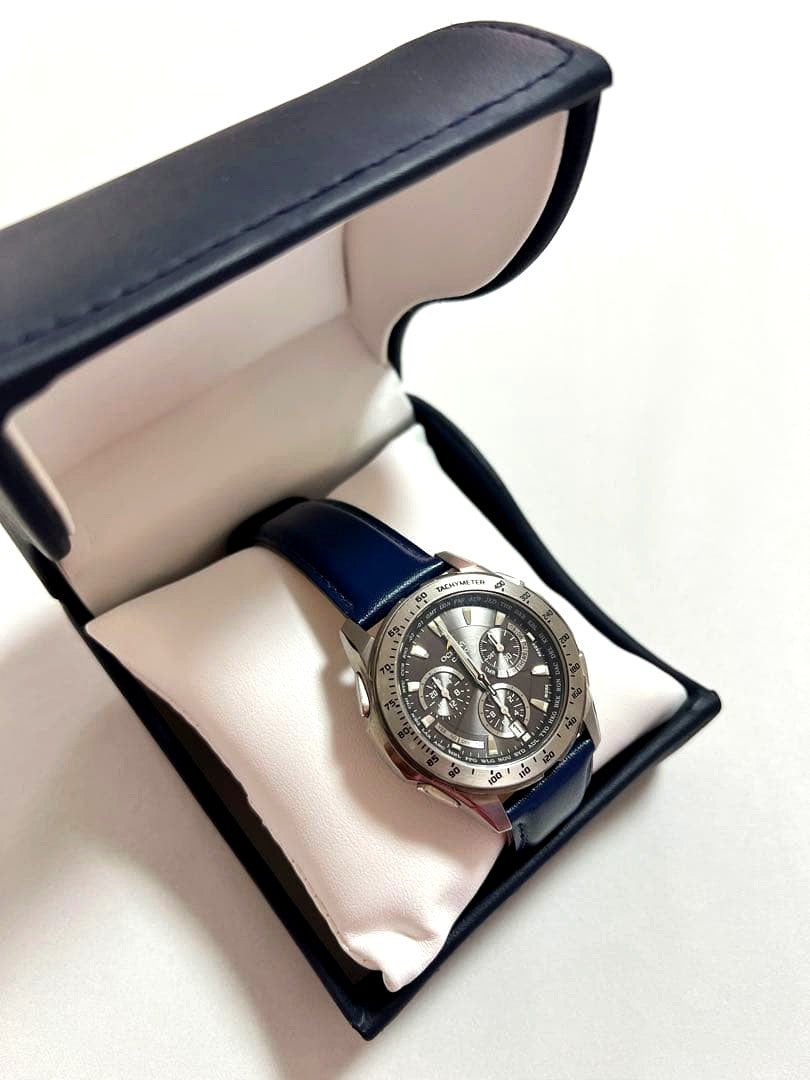 Casio Oceanus Navy wristwatch with stainless steel case and leather strap shown with box and warranty card