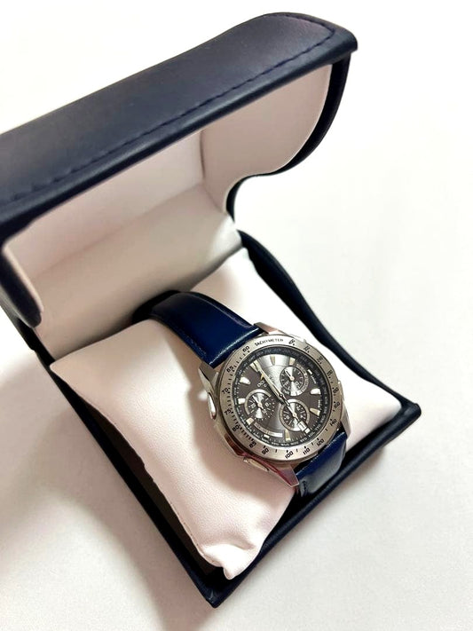 Casio Oceanus Navy wristwatch with stainless steel case and leather strap shown with box and warranty card