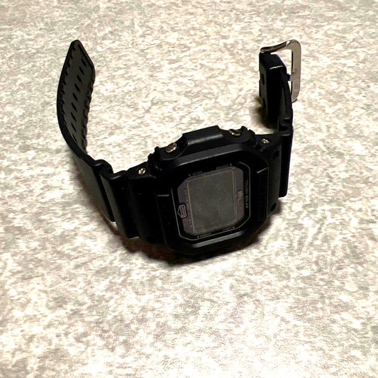 MHL x Casio G-Shock DW-5600 Series wristwatch with digital display and black resin band