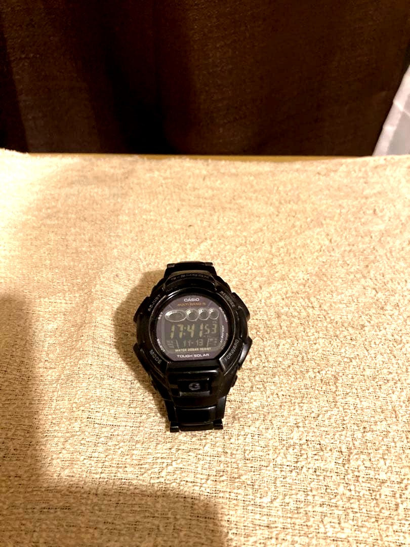 Casio G-Shock GW-810BD radio solar watch with metal band, showing slight color wear, Japan import