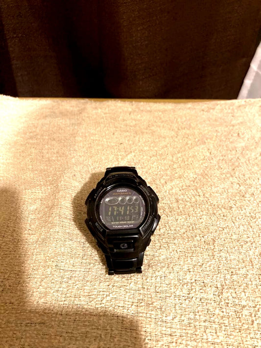 Casio G-Shock GW-810BD radio solar watch with metal band, showing slight color wear, Japan import