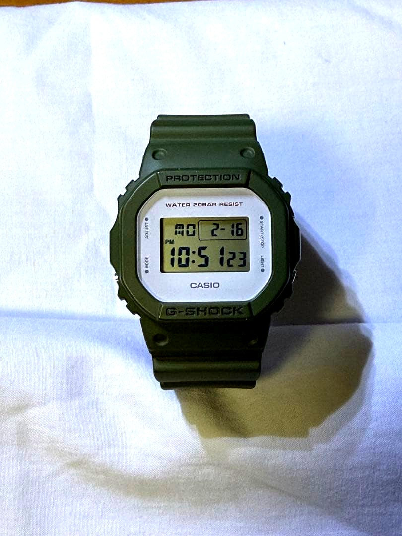 Casio G-Shock DW-5600M-3JF military green digital watch with green bezel and white dial