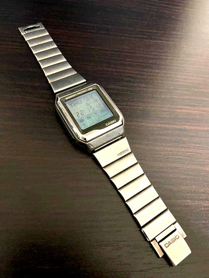 Casio Data Bank VDB-2000 HOTBIZ tarnished silver vintage Japanese electronic dictionary wristwatch with backlight