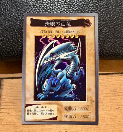 Bandai Blue-Eyes White Dragon Yugioh trading card from 1999 Japan import displayed on white background