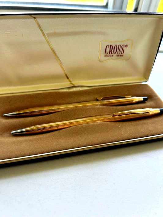 Cross pen and mechanical pencil set with two protective cases showing vintage signs of use