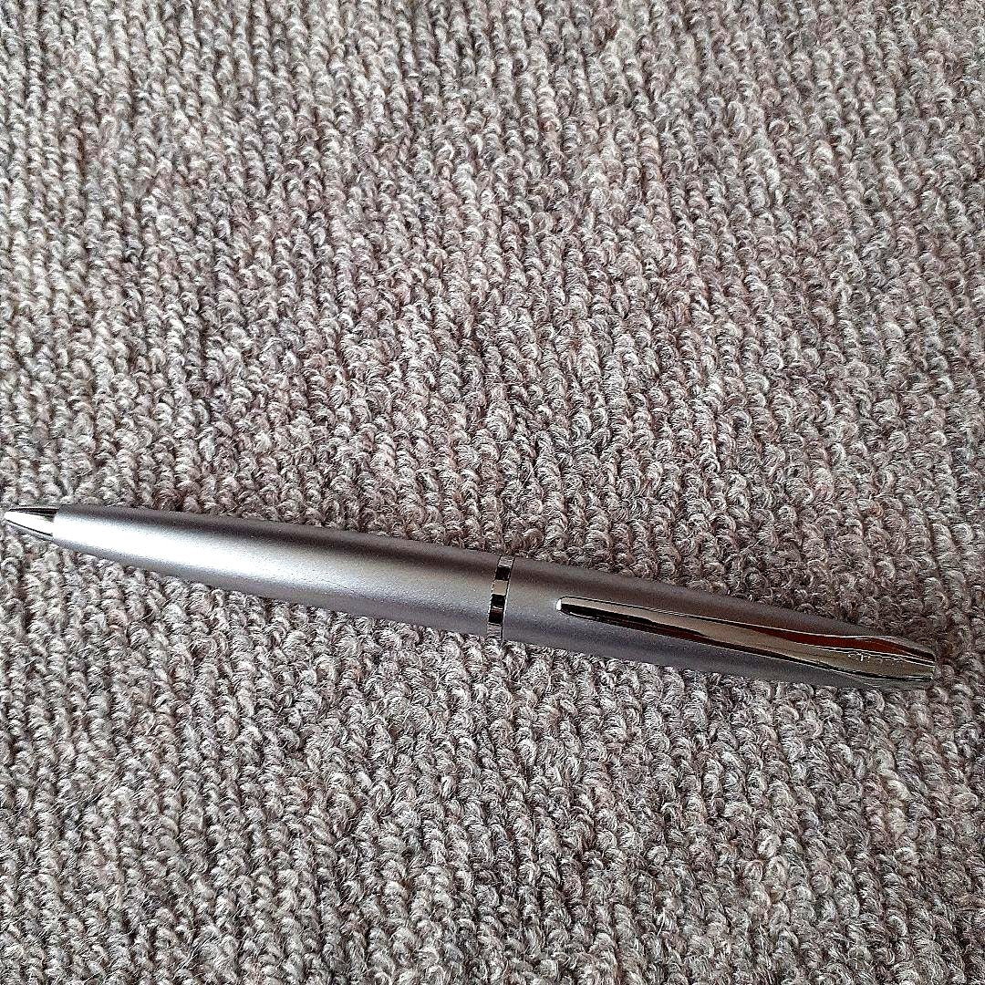 Cross Titanium Gray Ballpoint Pen in metal with sleek gray finish, brand new and unused.