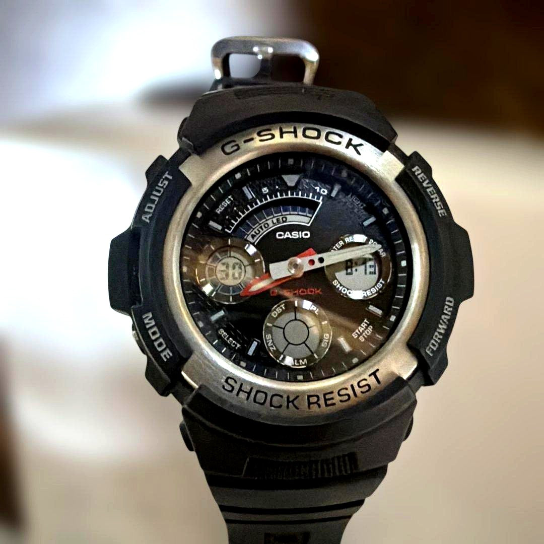 Casio G-Shock digital analog watch with black rubber band and stainless steel back case