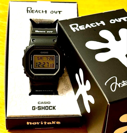 Casio G-Shock Ken Nakanishi Reach Out Limited Edition watch with black band and white art design
