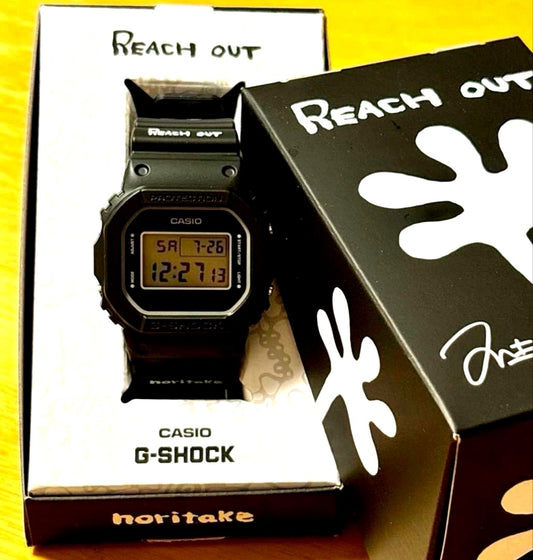 Casio G-Shock Ken Nakanishi Reach Out Limited Edition watch with black band and white art design