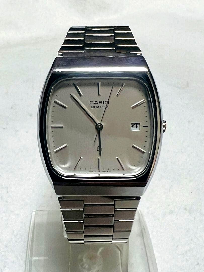 Casio MQ-505 men's quartz watch with silver dial and silver band, Japan import