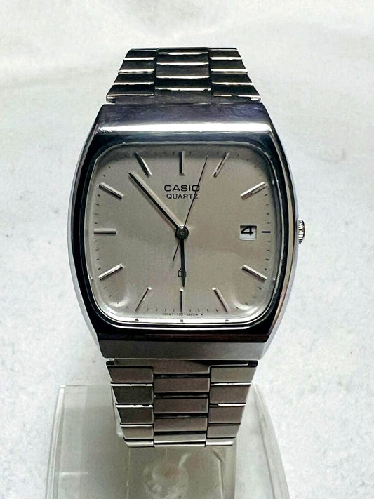 Casio MQ-505 men's quartz watch with silver dial and silver band, Japan import