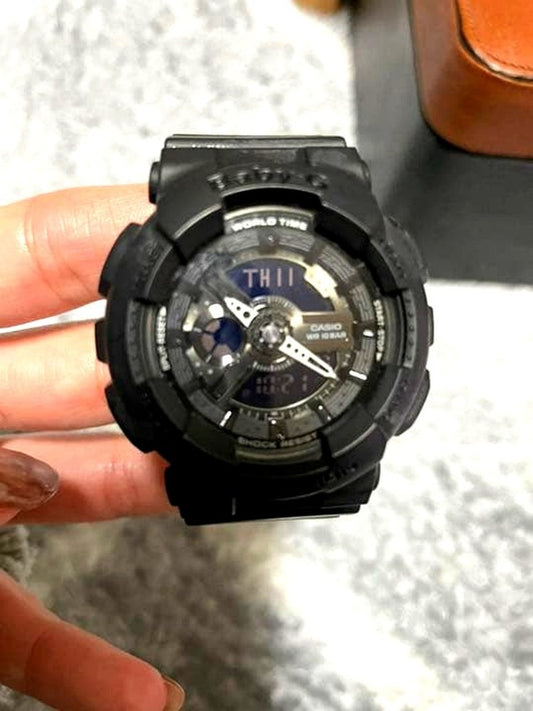 Casio G-Shock Series watch, used condition with some visible wear, black design