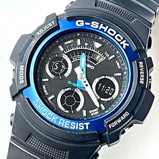 Casio G-Shock AW-591 shock resistant watch with digital and analog display, black resin band