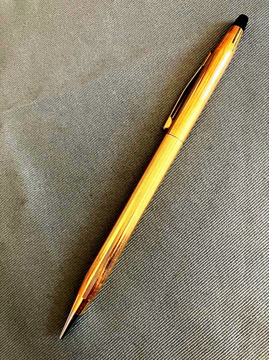 Cross Goldfield 12kt twist mechanical pencil with gold finish showing minor wear and discoloration