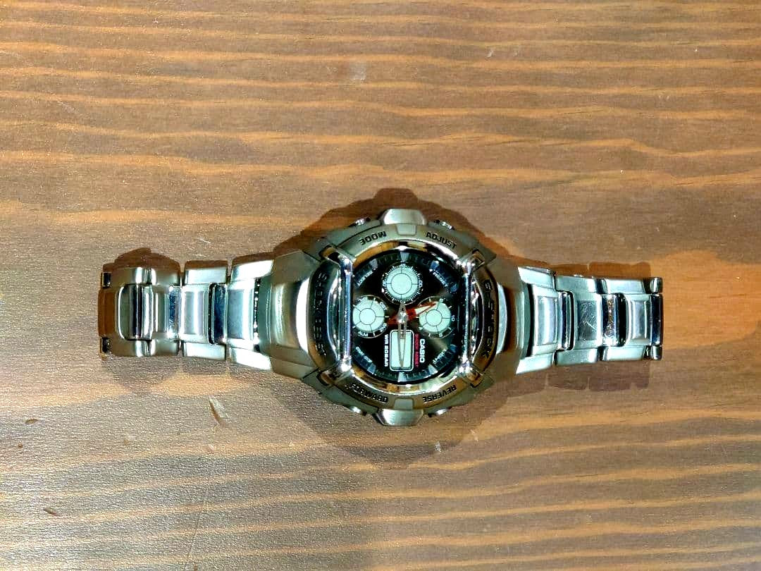 Casio G-Shock G-501D silver stainless steel round quartz watch with metal band