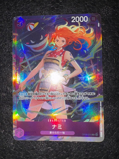 One Piece Nami promotional premium card in Japanese, showing front artwork and condition