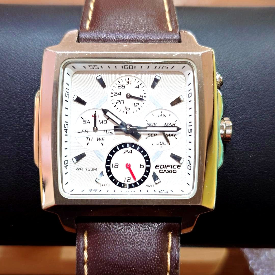 Casio Edifice Quartz watch showing the dial with scratches and dirt on the casing