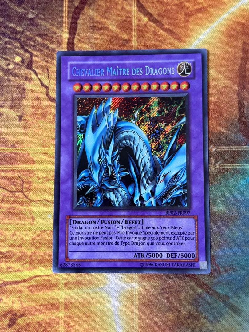 Bandai Duel Monsters Yu-Gi-Oh Ultimate Dragon Knight French Secret RP02 First Edition card with visible wear
