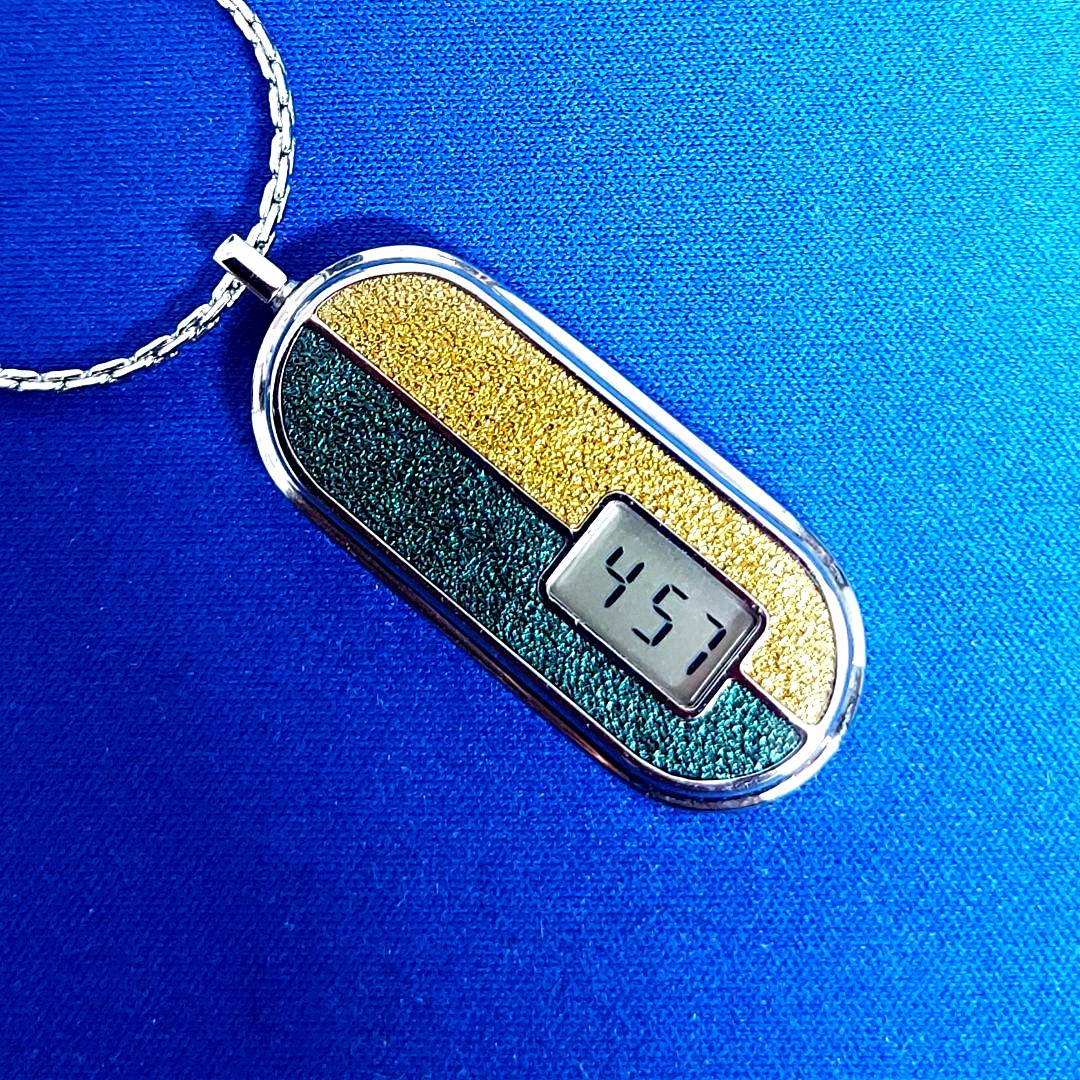 Casio LP-70 digital pendant watch with auto calendar in silver and 25-inch chain made in Japan