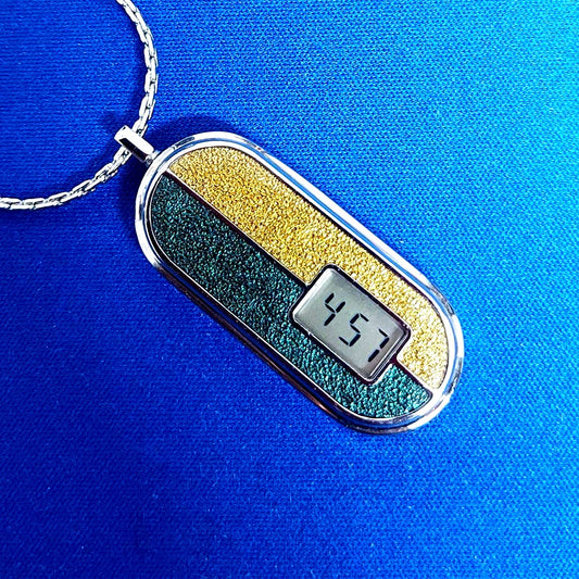 Casio LP-70 digital pendant watch with auto calendar in silver and 25-inch chain made in Japan