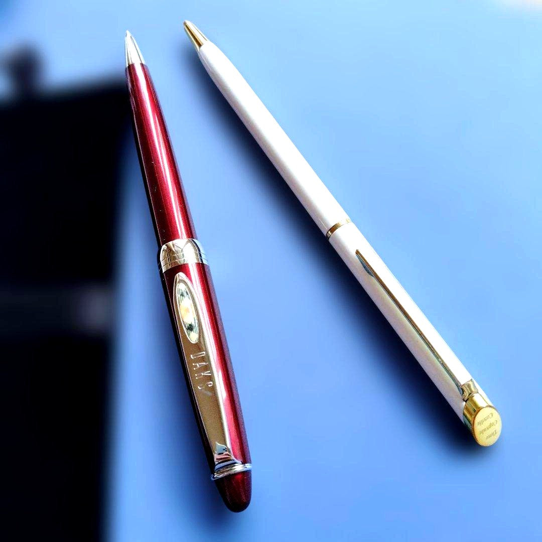 DAKS red ballpoint pen with silver clip and cap on white background metal body Japanese import