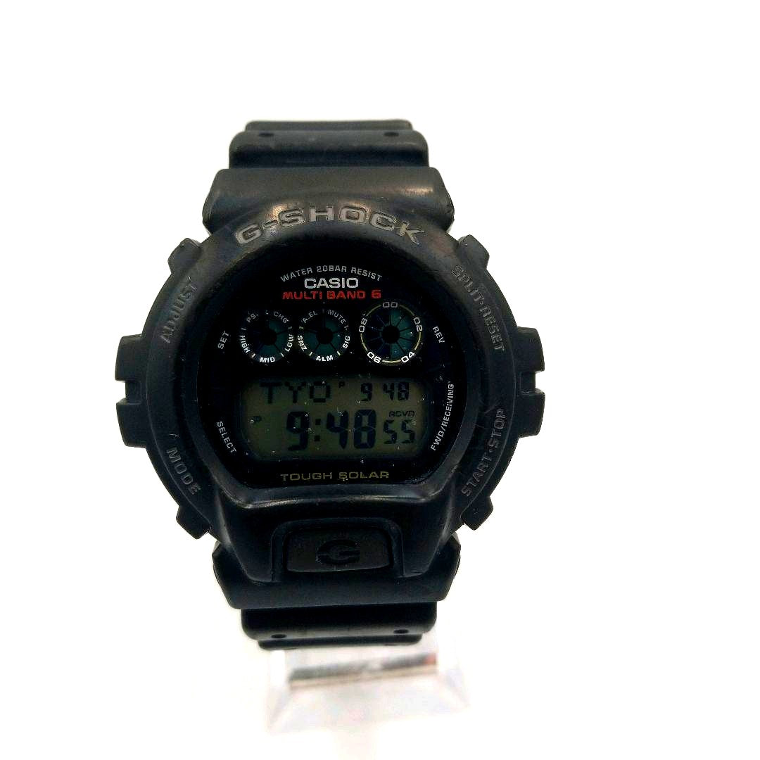 Casio G-Shock GW-6900 black solar digital watch with radio sync and black band on white background