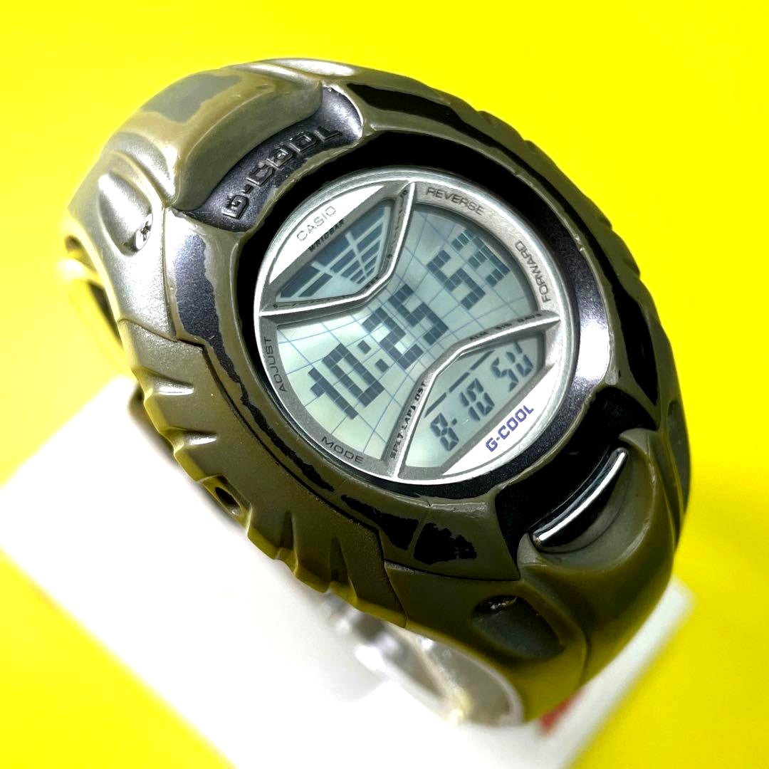 Casio G-Shock G-Cool watch with green silicone band and reversible mirror face