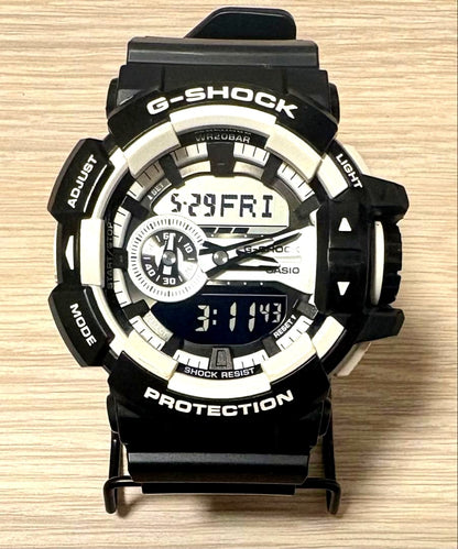 Casio G-Shock GA-400 black and white shock resistant watch with analog-digital display and large side rotary switch