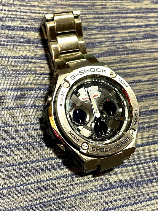 Casio G-Shock G-Steel GST-W110D-1AJF silver solar radio watch with stainless steel band