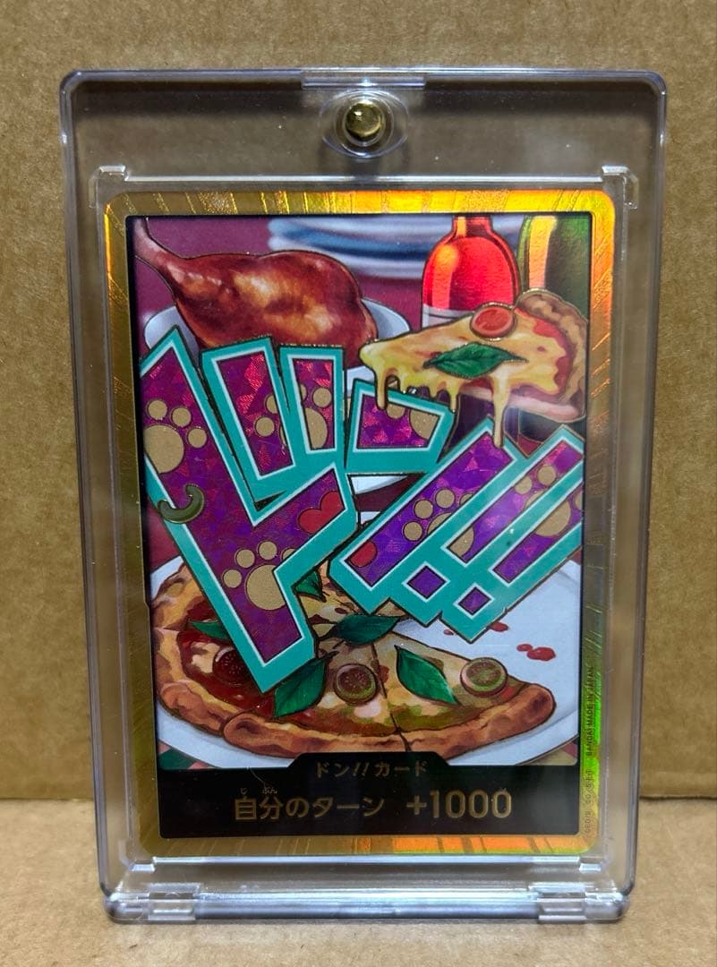 One Piece Don Card Gold Don Jewelry featuring Bonnie Pizza with included sleeves and loader for storage
