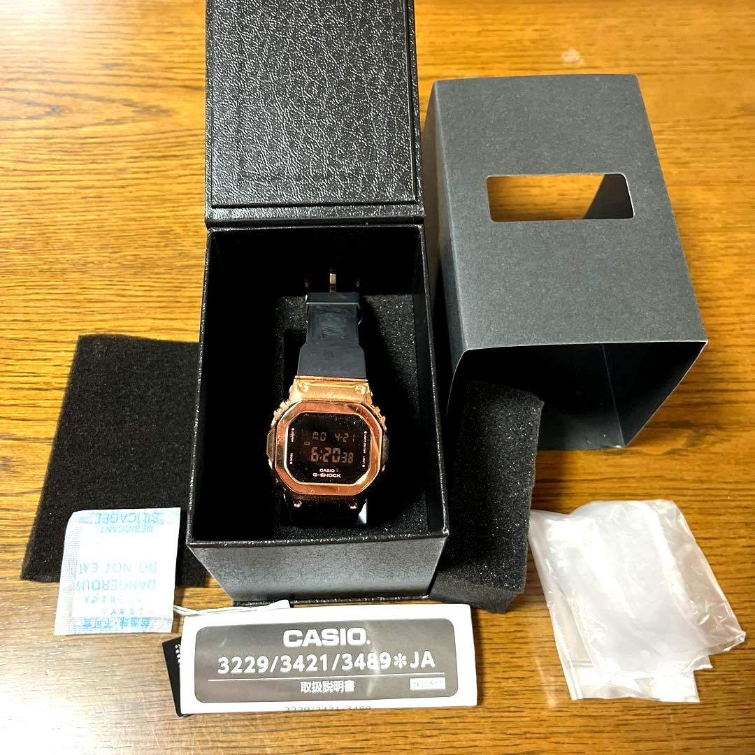 Casio G-Shock GM-S5600PG-1JF digital wristwatch with black and rose gold finish