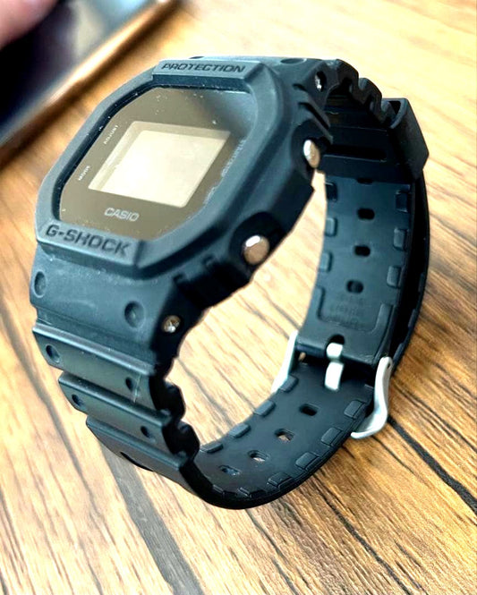 Casio G-Shock black digital watch with shock-resistant design and digital display