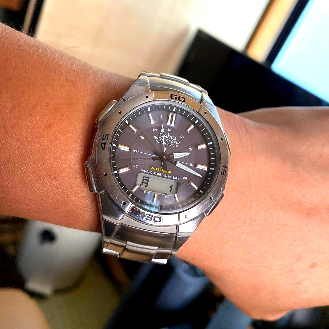 Seapter brown stainless steel watch with round solar-powered dial and brown stainless steel band