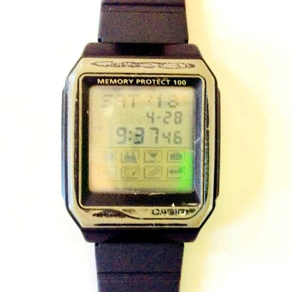Casio Touchscreen Black vintage watch with touchscreen and black body showing signs of age