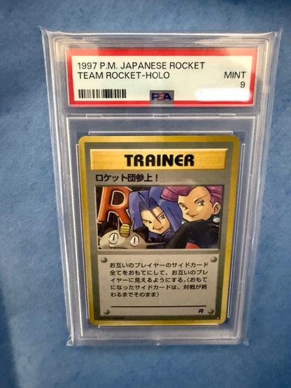 Bandai Rocket-dan Pokémon card with PSA 9 grade and old back design in protective case