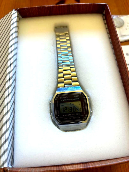 Casio Digital Stainless Steel Watch with clear display, stainless steel band, shown in excellent used condition