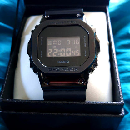 Casio G-Shock GM-5600B black digital watch with square case showing front view
