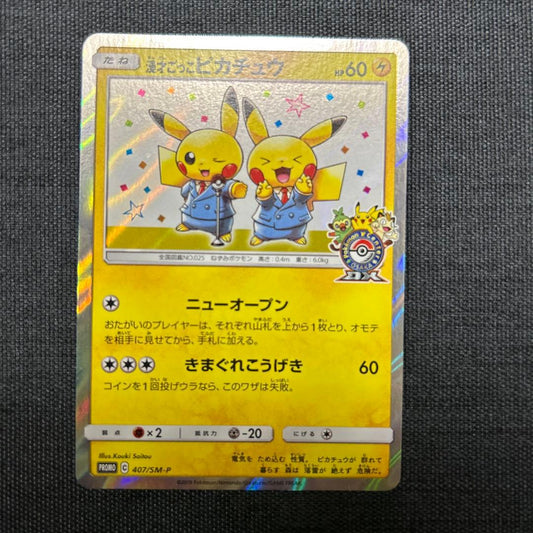 Pokemon Center Osaka DX Promo Pikachu Pokemon Card 407/SM-P with visible creases and scratches