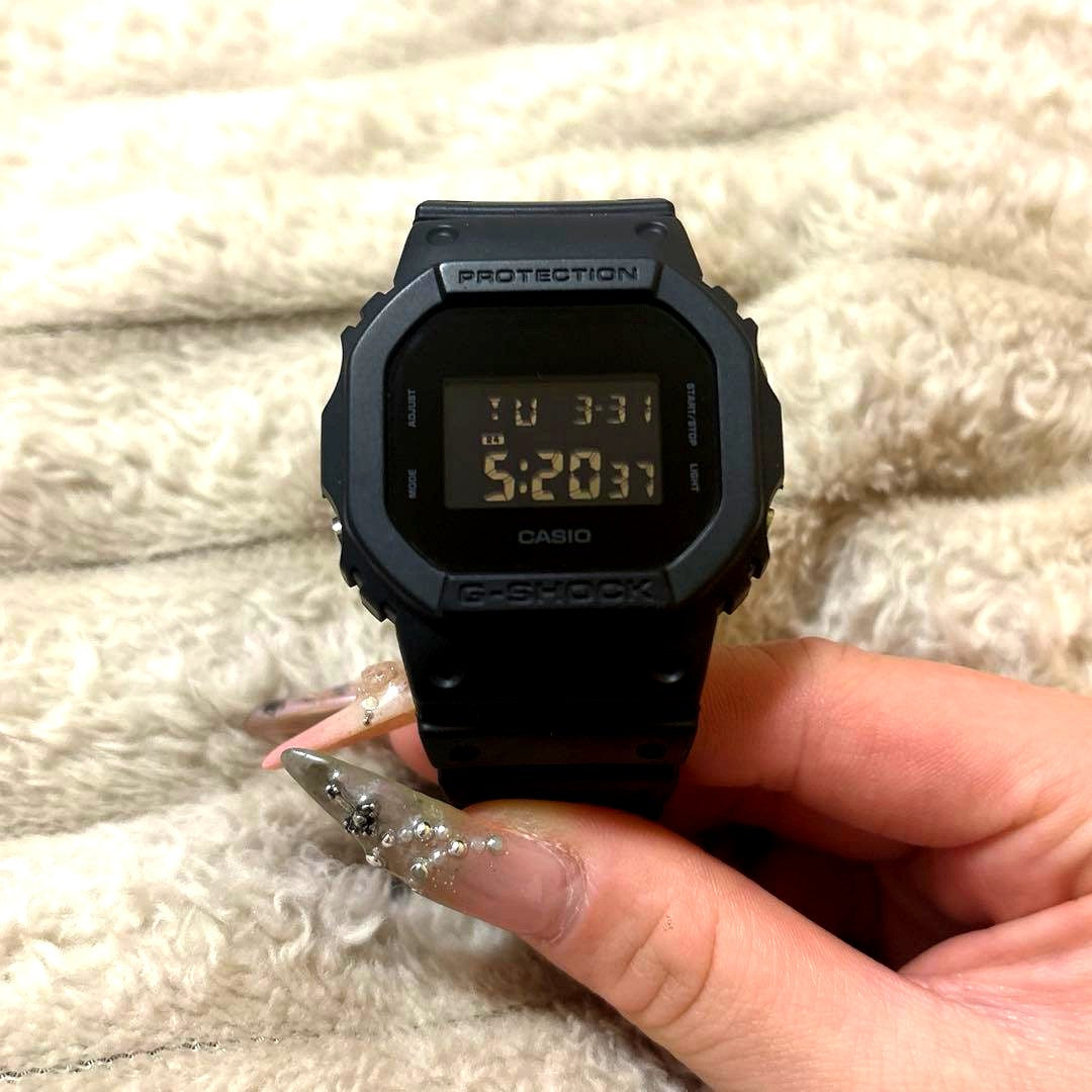 Casio G-Shock DW-5600BB-1 black digital wristwatch in clean used condition with no accessories